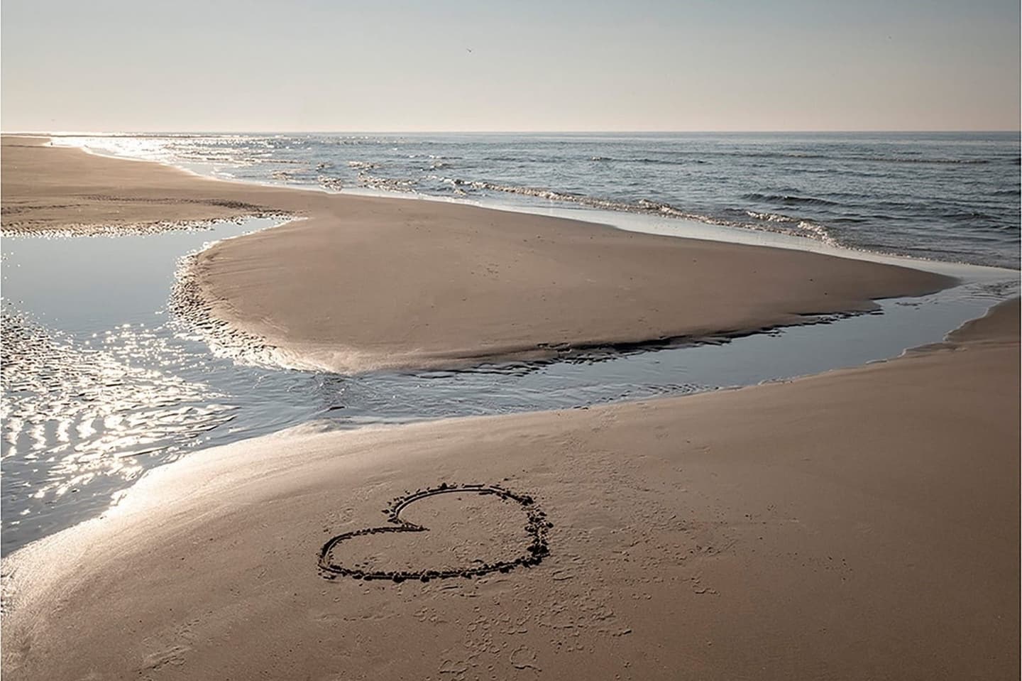 Strand Terschelling bij mooi weer, vakantie vakantiehuis Duinhuis
